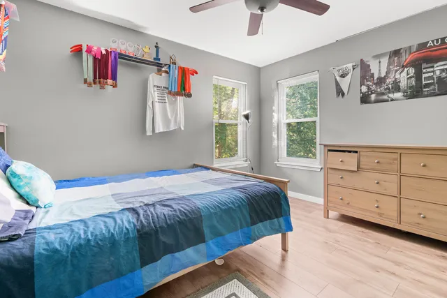 a view of a house with a yard porch and sitting area