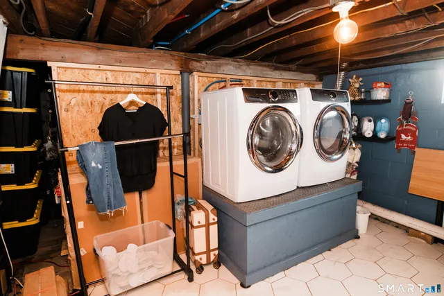a utility room with dryer and washer