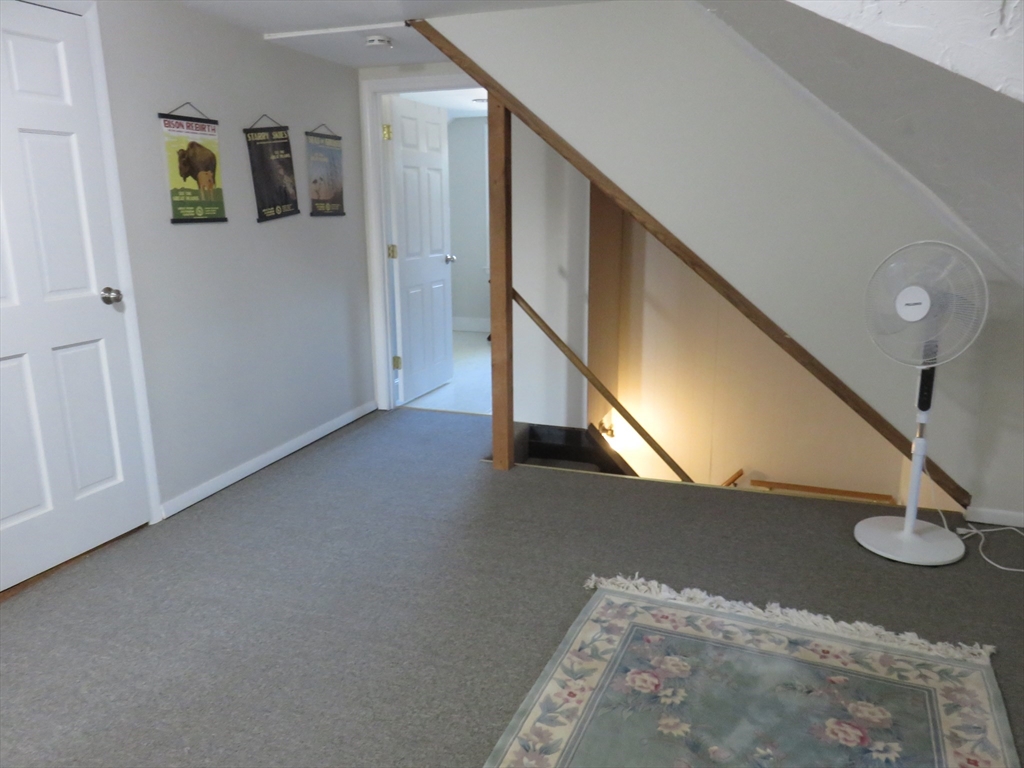 105 Plympton Street, Unit 2 Waltham, MA 02451 - Photo 16 of 27 a view of hallway with stairs