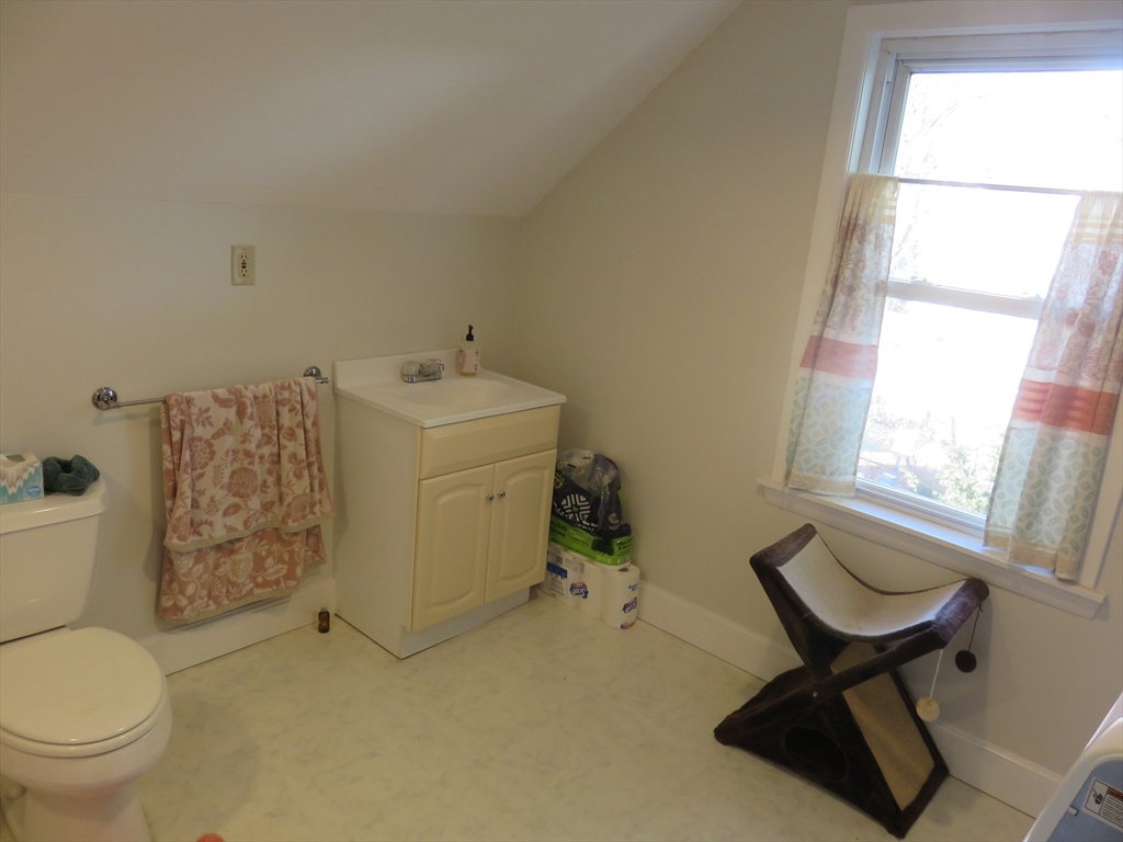 105 Plympton Street, Unit 2 Waltham, MA 02451 - Photo 17 of 27 a utility room with dryer and washer