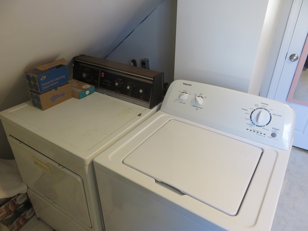 105 Plympton Street, Unit 2 Waltham, MA 02451 - Photo 27 of 27 a utility room with dryer and washer