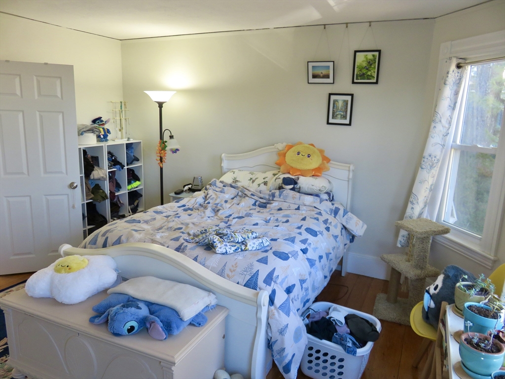 105 Plympton Street, Unit 2 Waltham, MA 02451 - Photo 10 of 27 a living room with furniture and a table