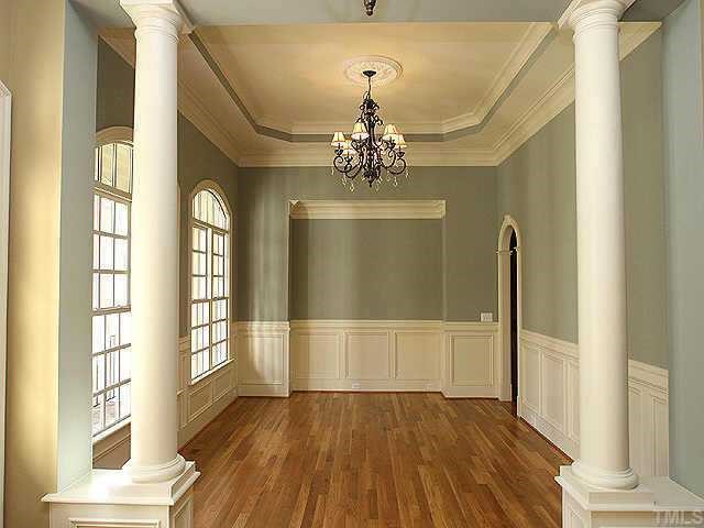 2416 Loring Court Raleigh, NC 27613 - Photo 3 of 10 a view of livingroom with hallway and wooden floor