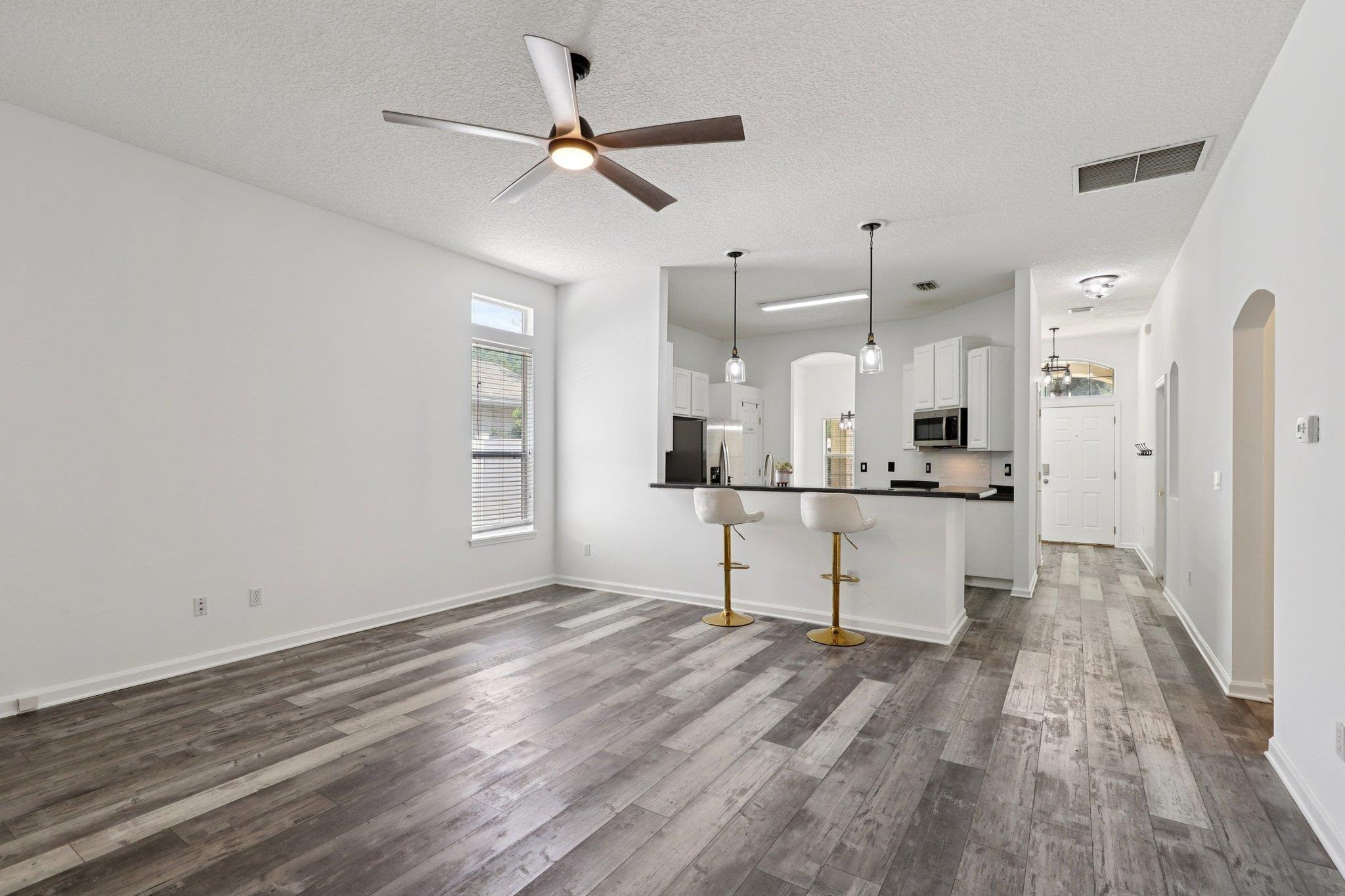 1821 Keswick Road St. Augustine, FL 32084 - Photo 13 of 57 a view of kitchen with sink microwave and refrigerator