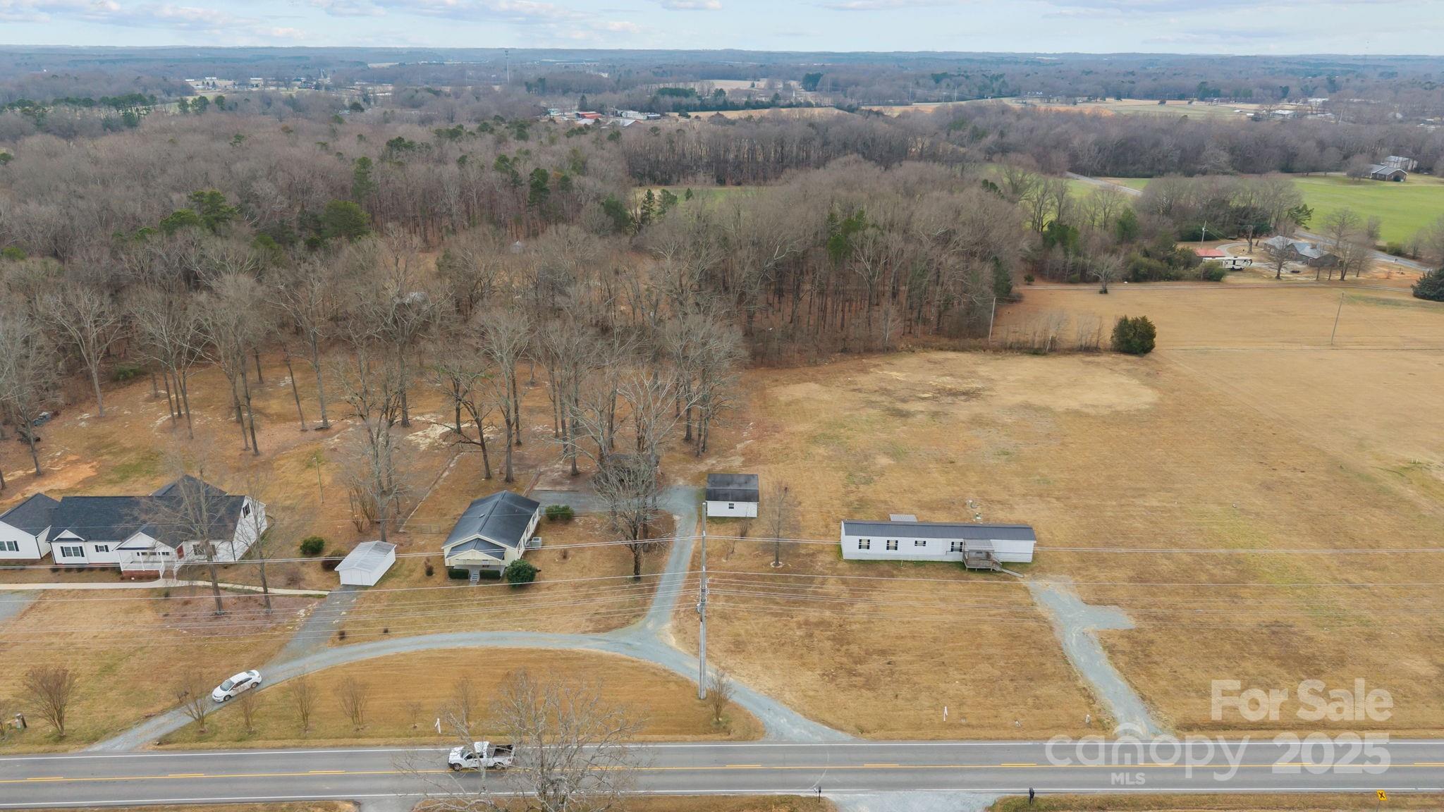 2909 New Town Road Monroe, NC 28110 - Photo 24 of 31 an aerial view of a house with outdoor space