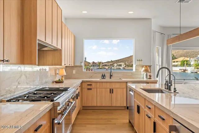 a bathroom with a sink a bath tub and shower