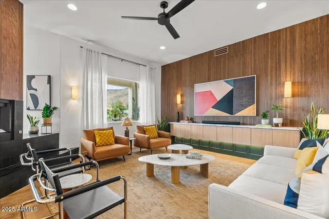 a bedroom with a bed and a night stand