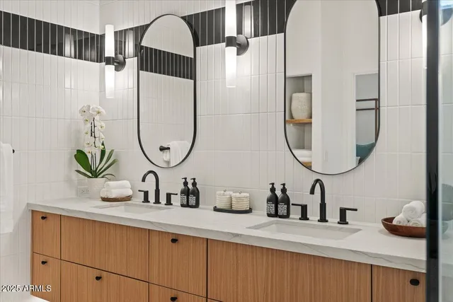 a front view of a house with swimming pool and sitting area