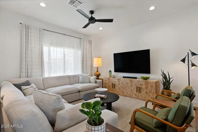 a kitchen with a table and chairs