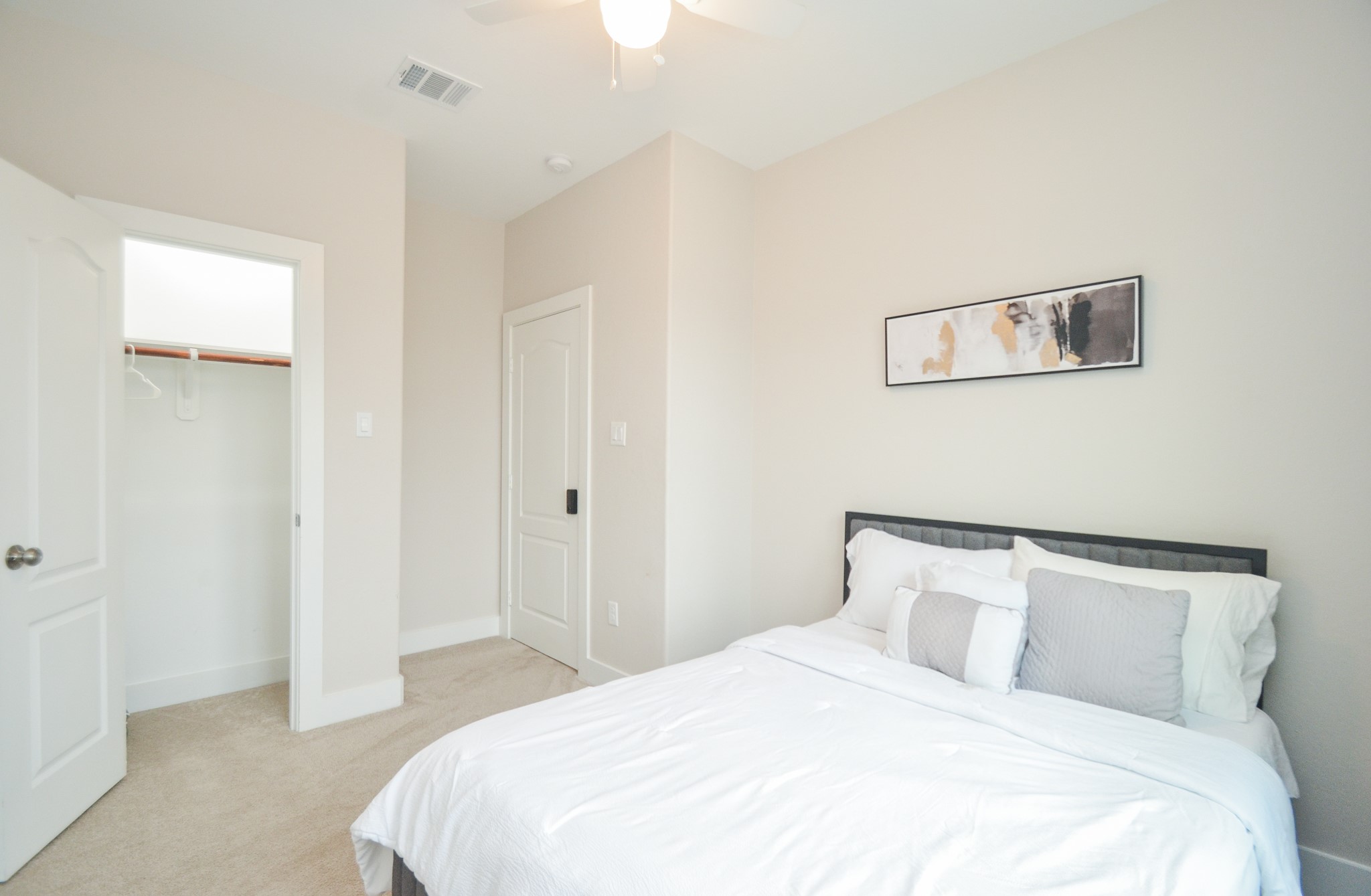 4511 Reed Road Houston, TX 77051 - Photo 21 of 39 a bedroom with a bed and a mirror