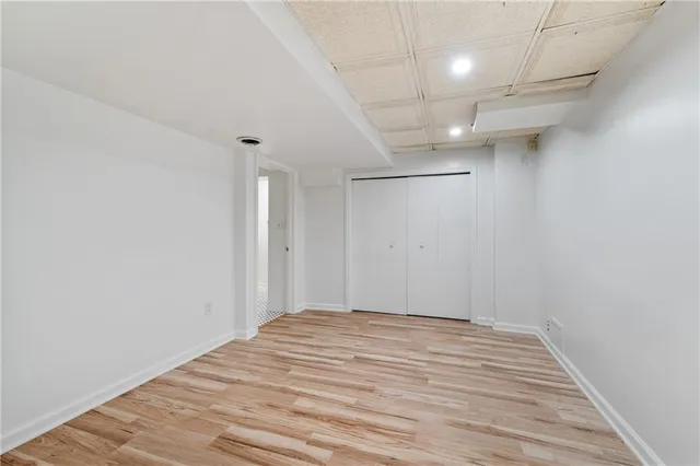 a bathroom with a sink a toilet and a shower