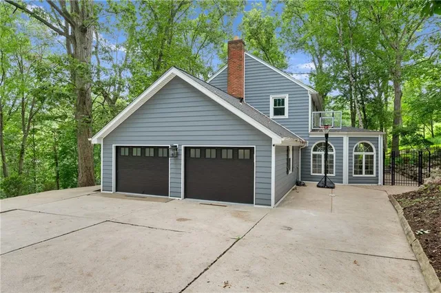 a house with trees in front of it