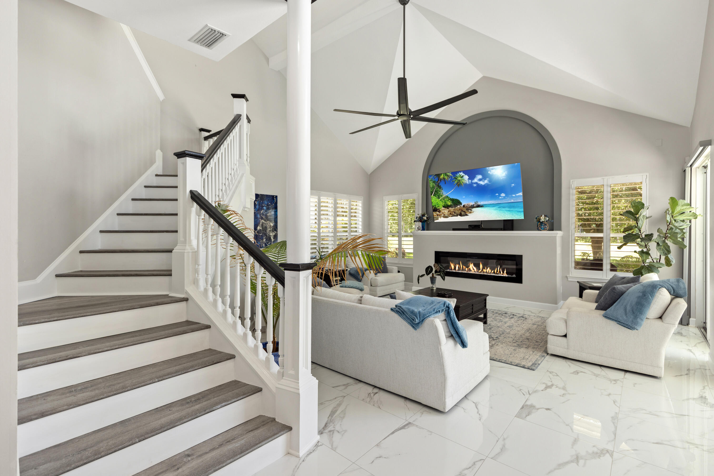 96 Garnet Place Destin, FL 32541 - Photo 22 of 90 a living room with furniture a fireplace and a flat screen tv