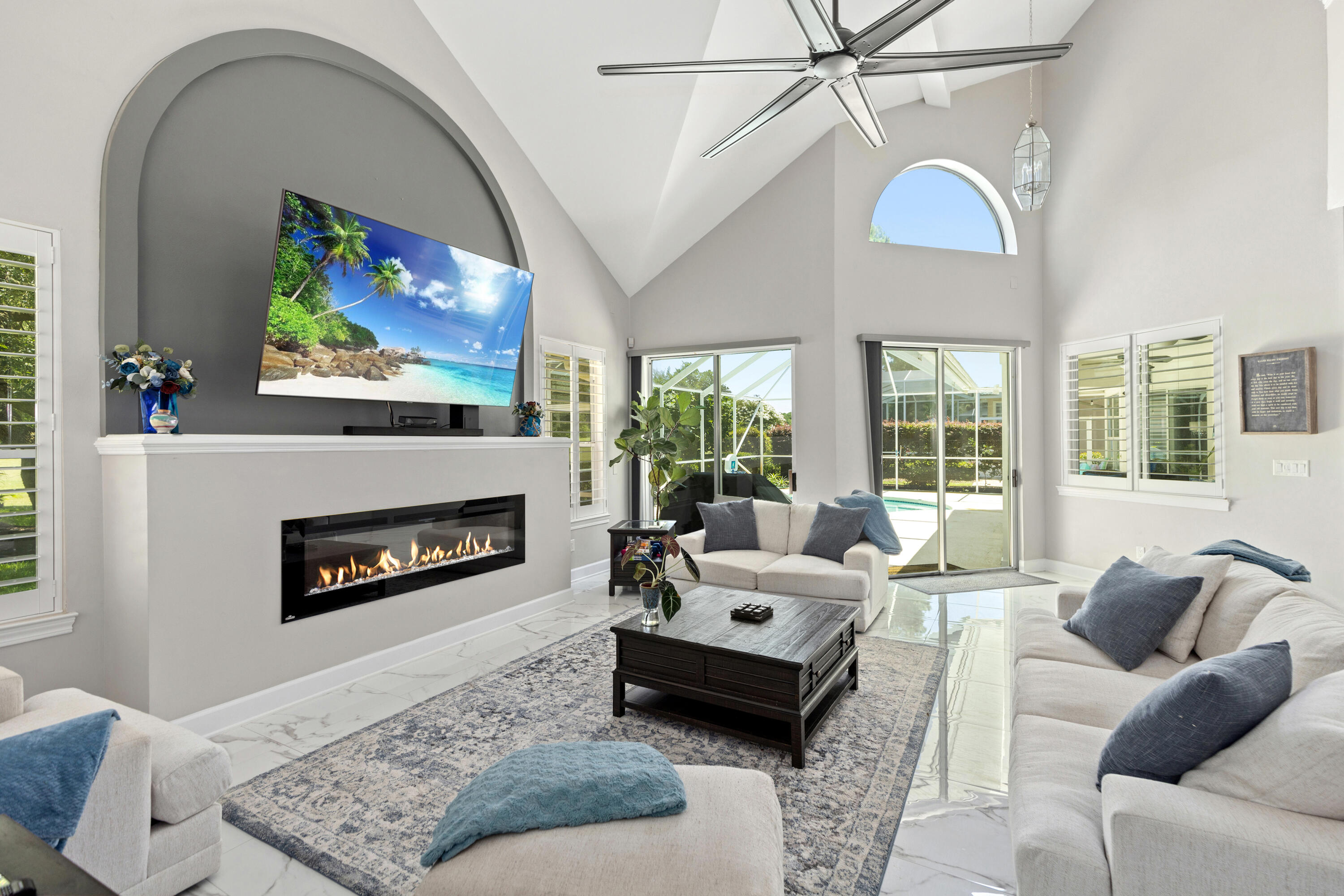 96 Garnet Place Destin, FL 32541 - Photo 23 of 90 a living room with furniture a flat screen tv and a fireplace