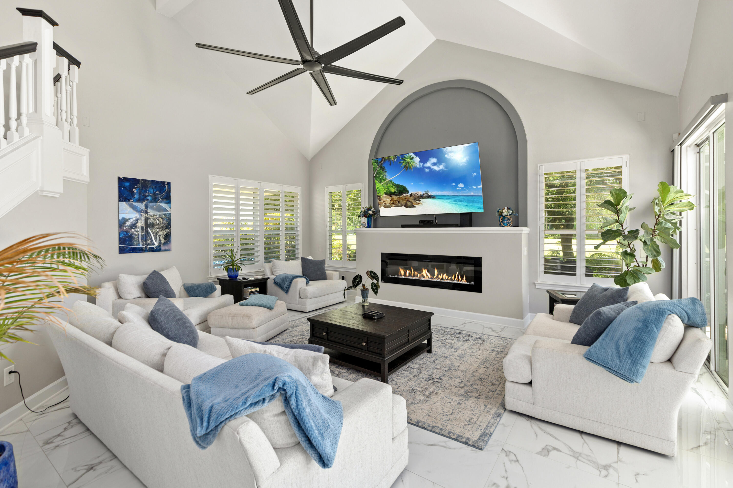 96 Garnet Place Destin, FL 32541 - Photo 23 of 90 a living room with furniture a fireplace and a flat screen tv