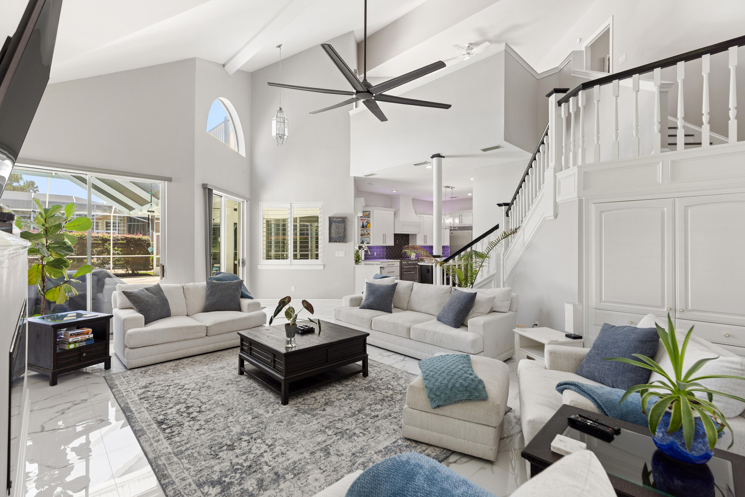 96 Garnet Place Destin, FL 32541 - Photo 25 of 90 a living room with furniture ceiling fan and a rug