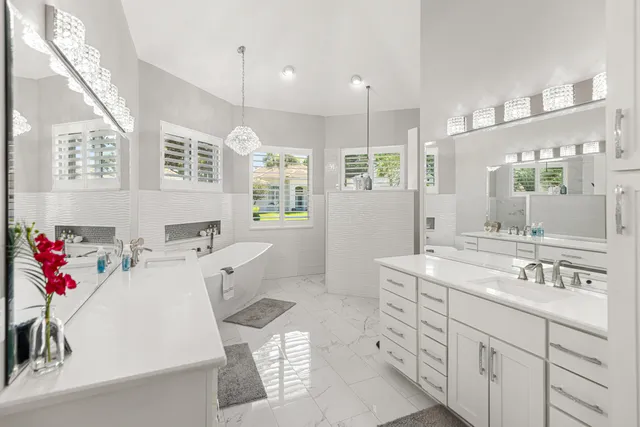 a view of a dining room with furniture wooden floor and fan
