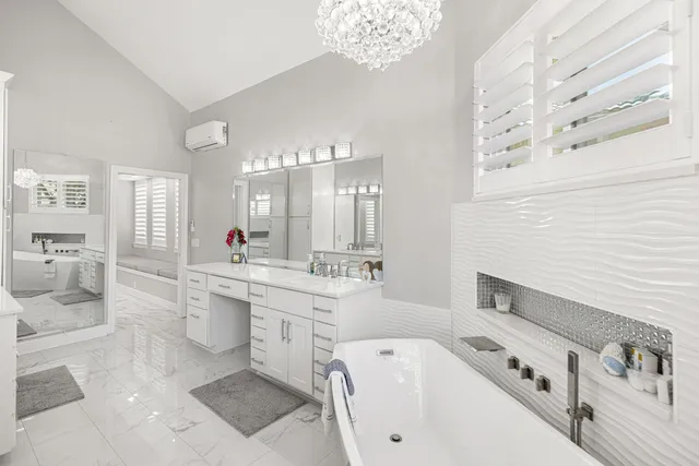a view of a dining room with furniture wooden floor and fan