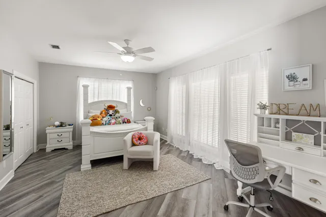 an aerial view of a house with yard swimming pool and outdoor seating