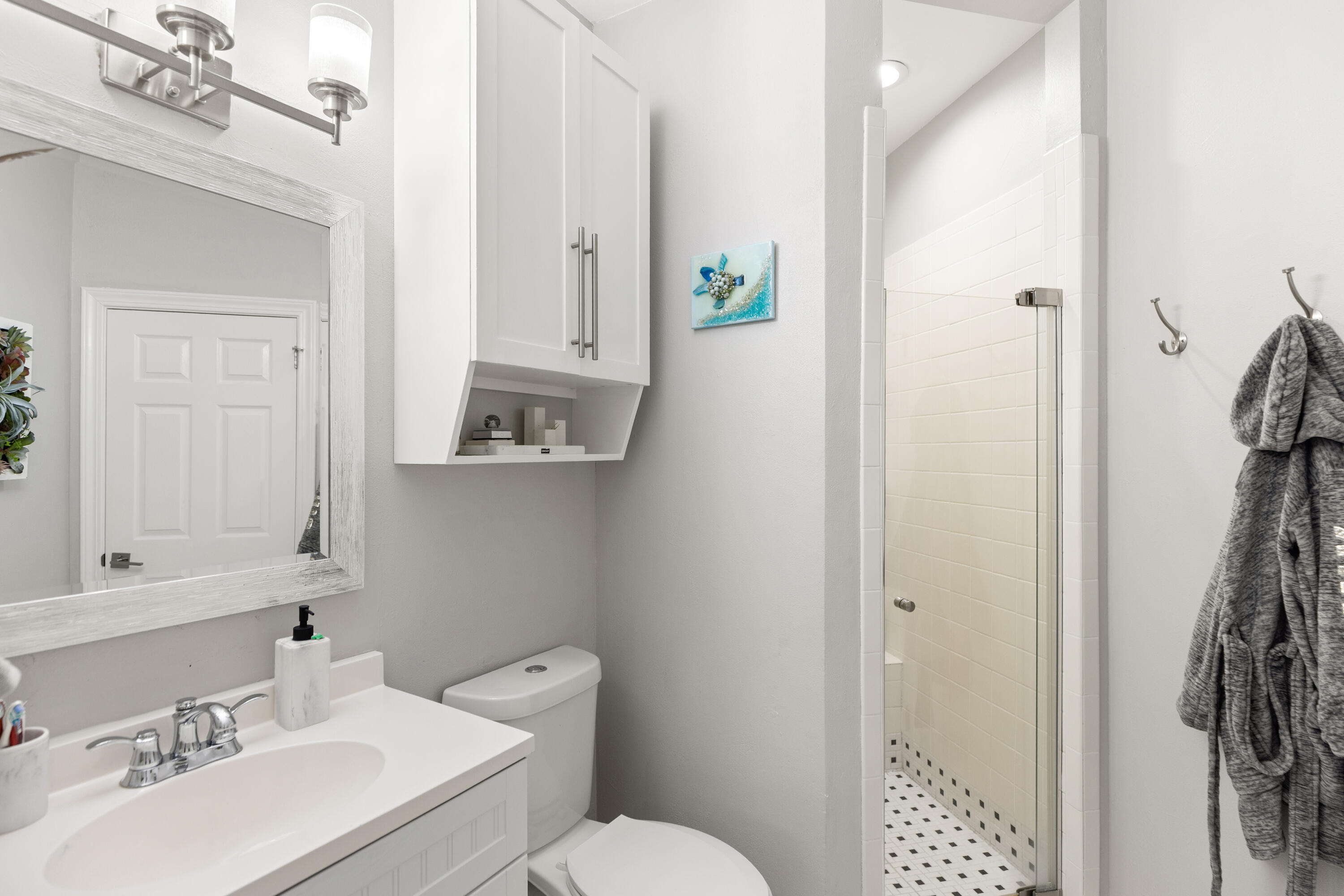 96 Garnet Place Destin, FL 32541 - Photo 43 of 90 a bathroom with a sink toilet and shower