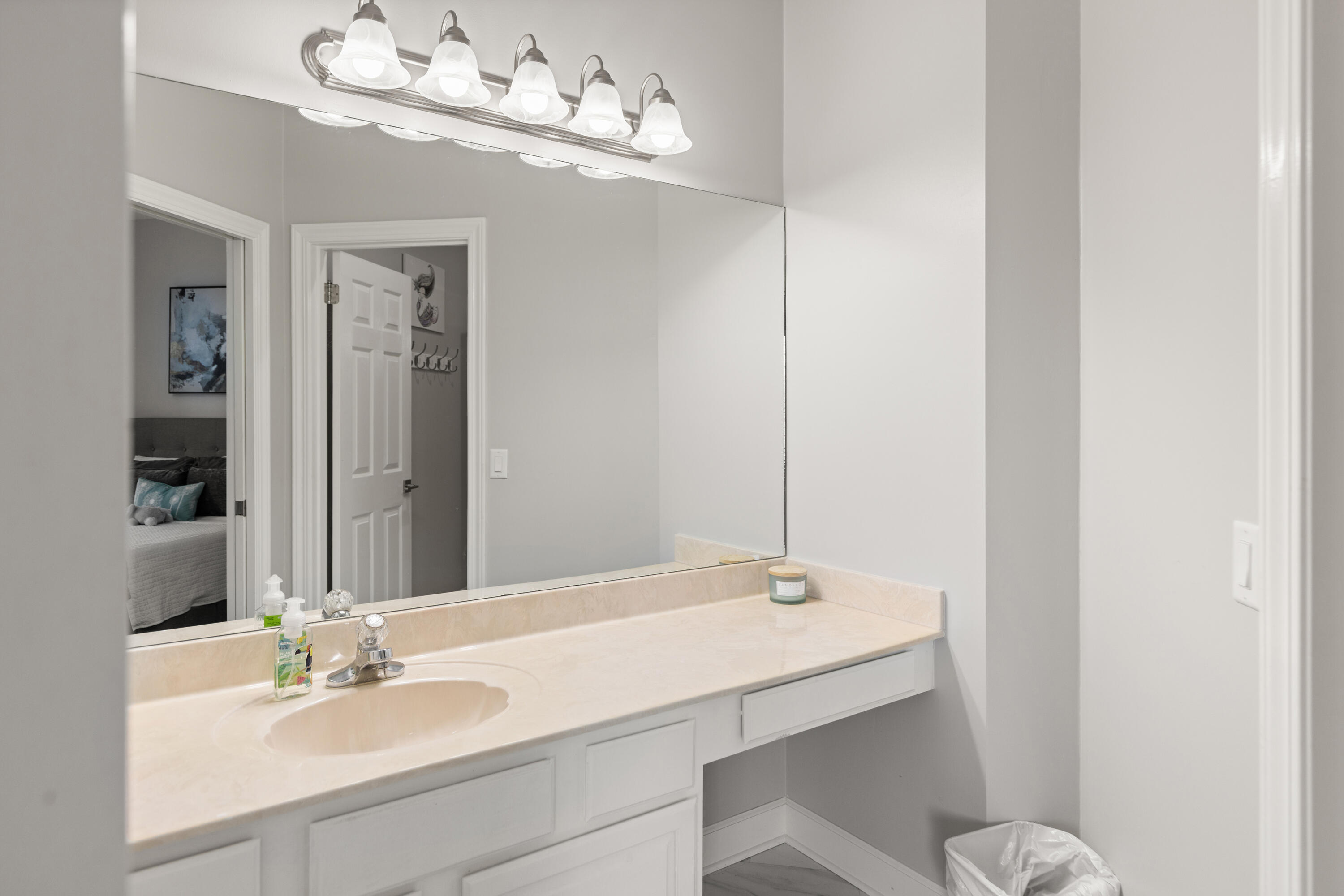 96 Garnet Place Destin, FL 32541 - Photo 49 of 90 a bathroom with a sink and a mirror