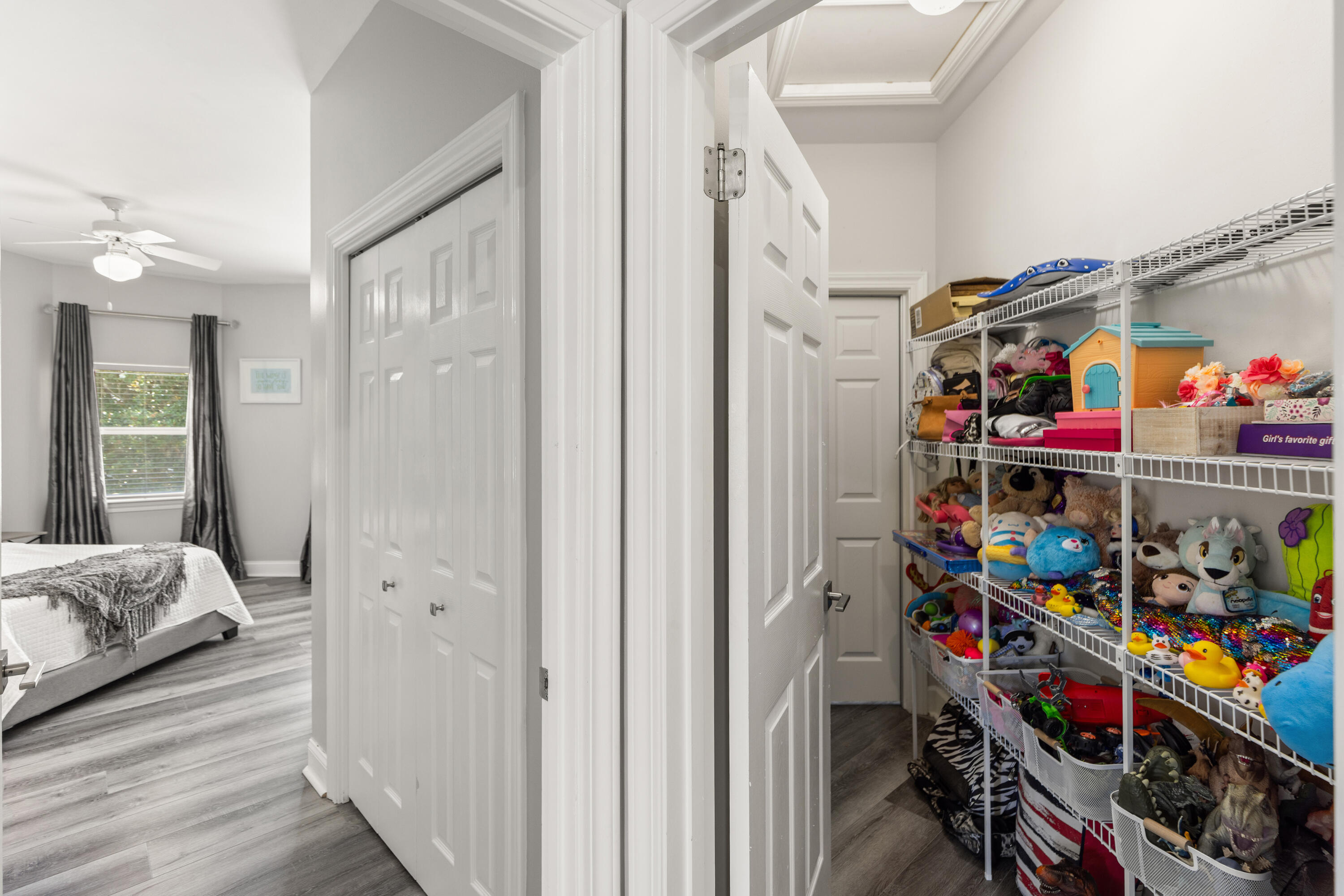 96 Garnet Place Destin, FL 32541 - Photo 55 of 90 a view of an entryway with hallway and toys