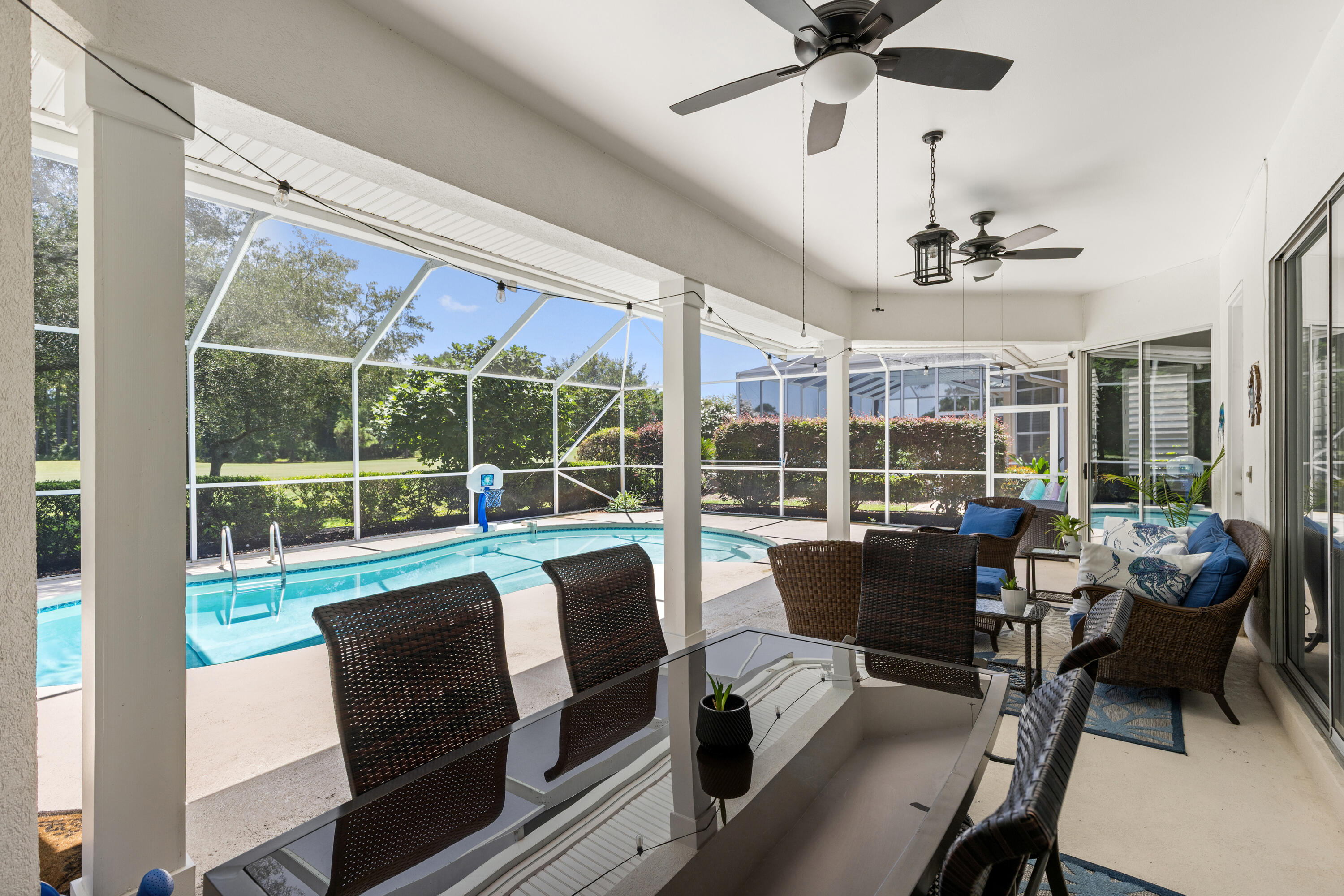 96 Garnet Place Destin, FL 32541 - Photo 58 of 90 a view of a dining room with furniture wooden floor and fan