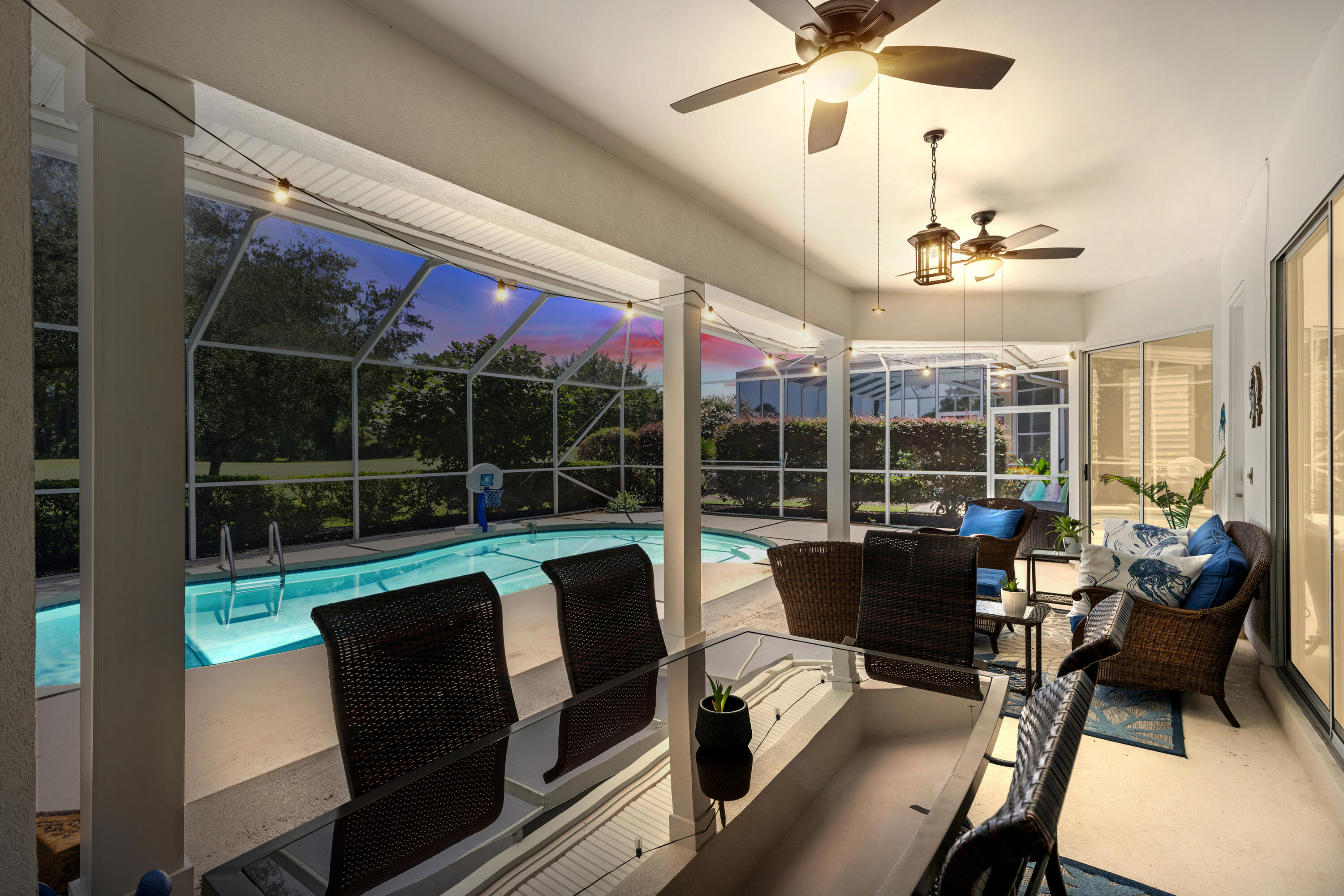 96 Garnet Place Destin, FL 32541 - Photo 59 of 90 a view of a dining room with furniture wooden floor and fan