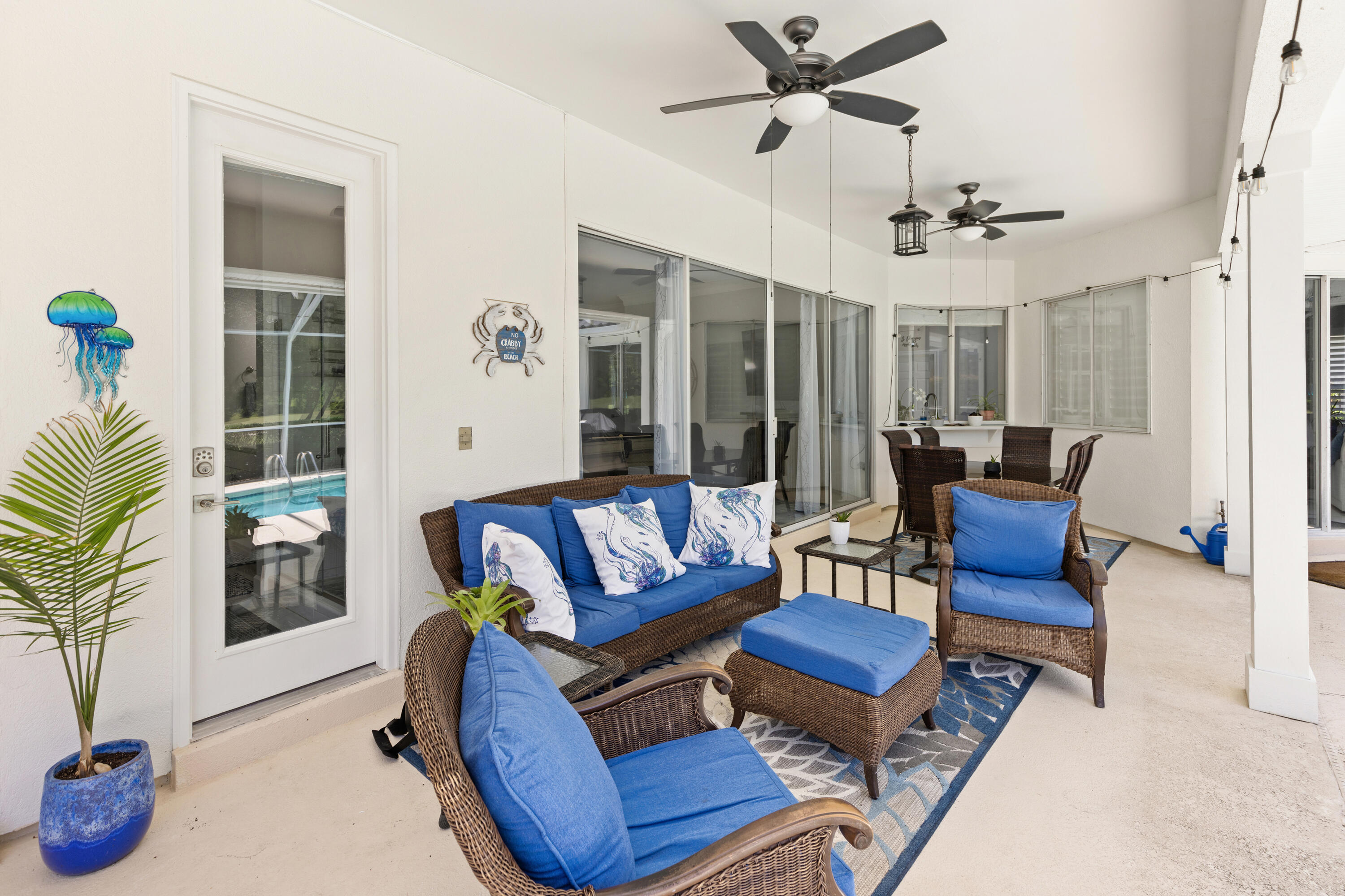 96 Garnet Place Destin, FL 32541 - Photo 61 of 90 a living room with furniture and a potted plant
