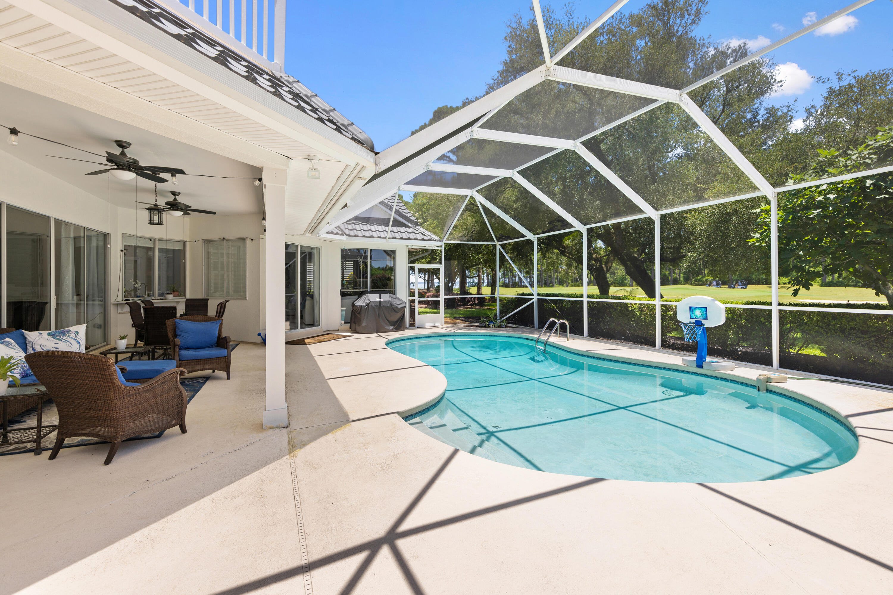 96 Garnet Place Destin, FL 32541 - Photo 62 of 90 a view of a patio with couches and a table and chairs
