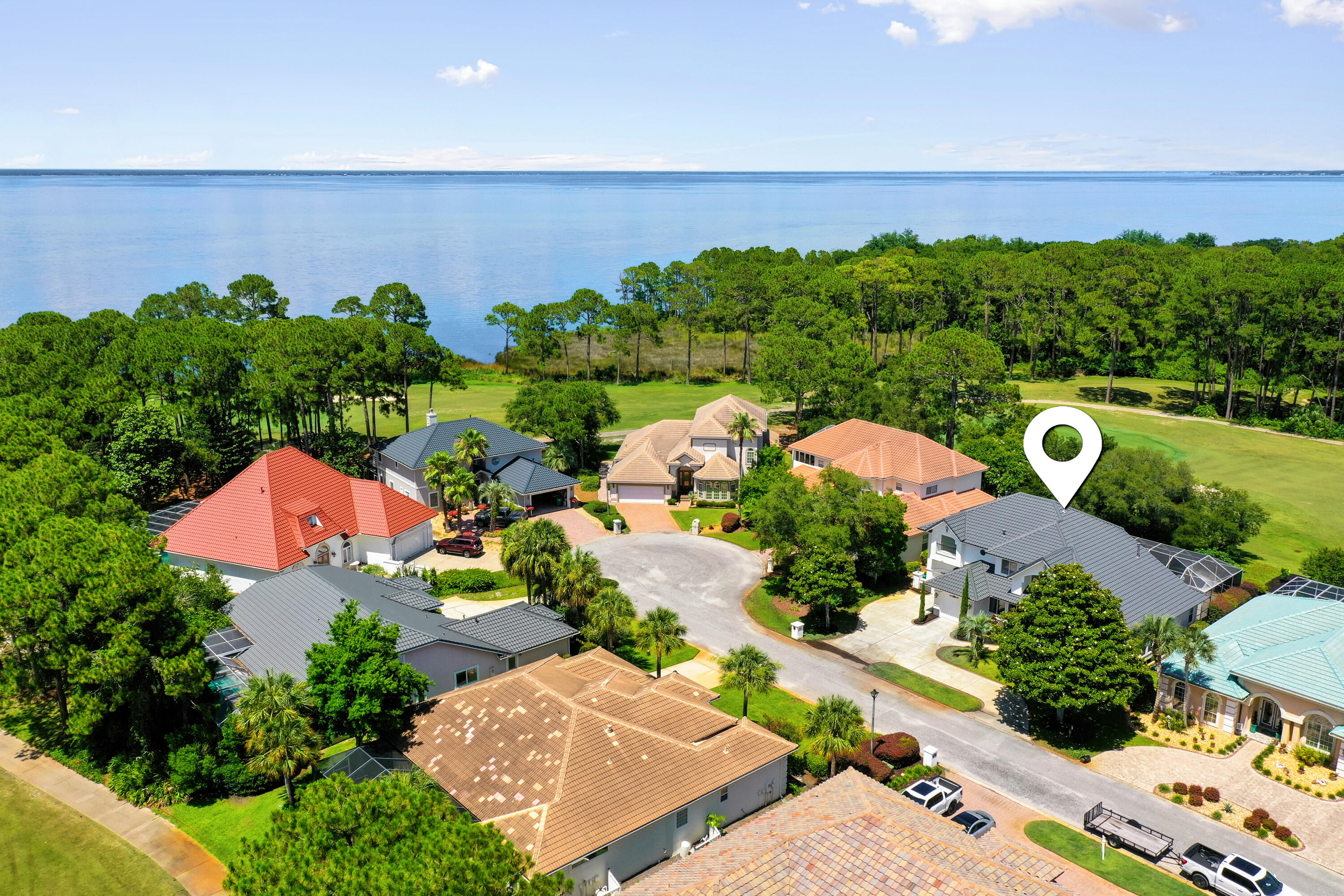 96 Garnet Place Destin, FL 32541 - Photo 73 of 90 an aerial view of a house with garden space and street view