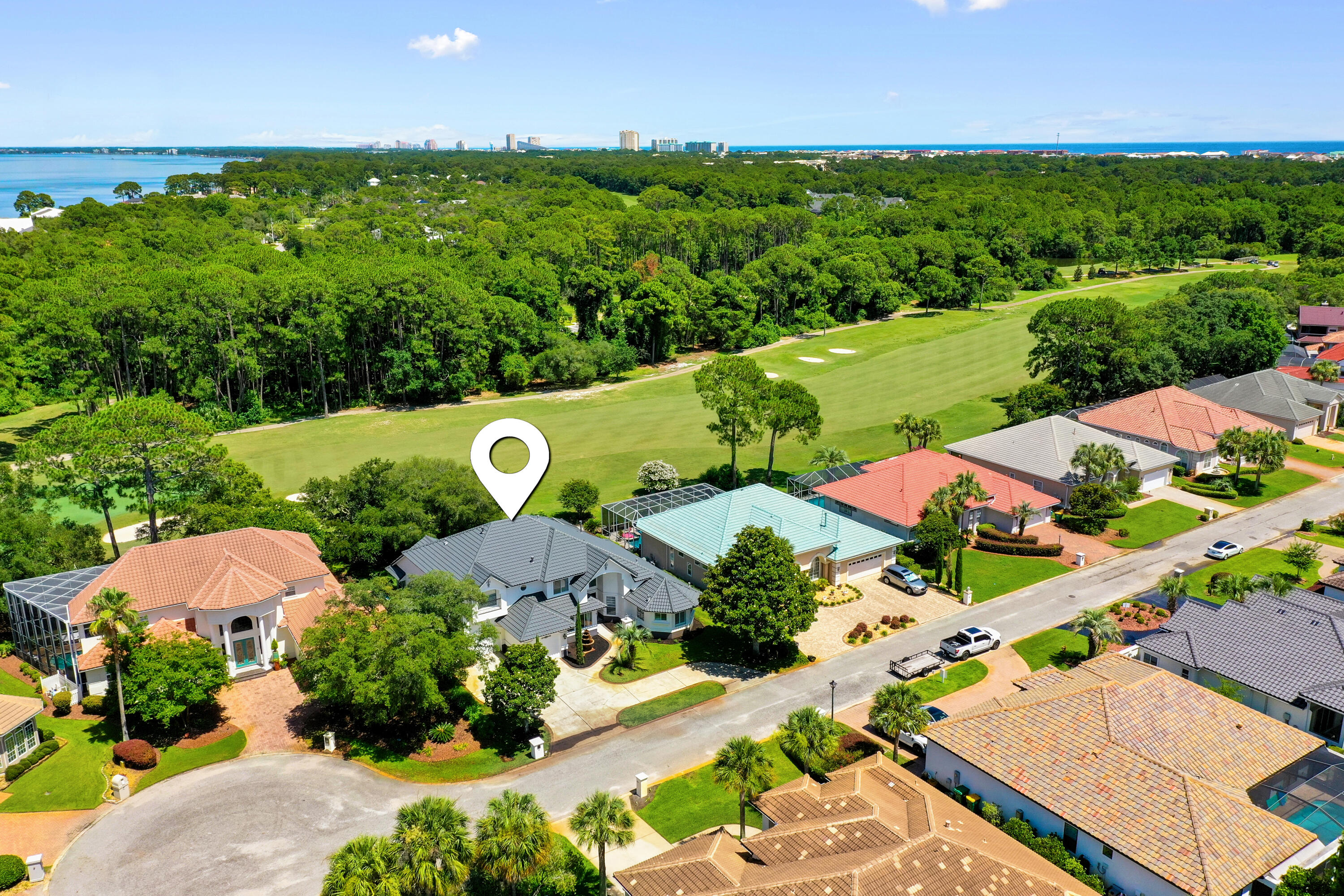 96 Garnet Place Destin, FL 32541 - Photo 74 of 90 an aerial view of a house with yard swimming pool outdoor seating and yard