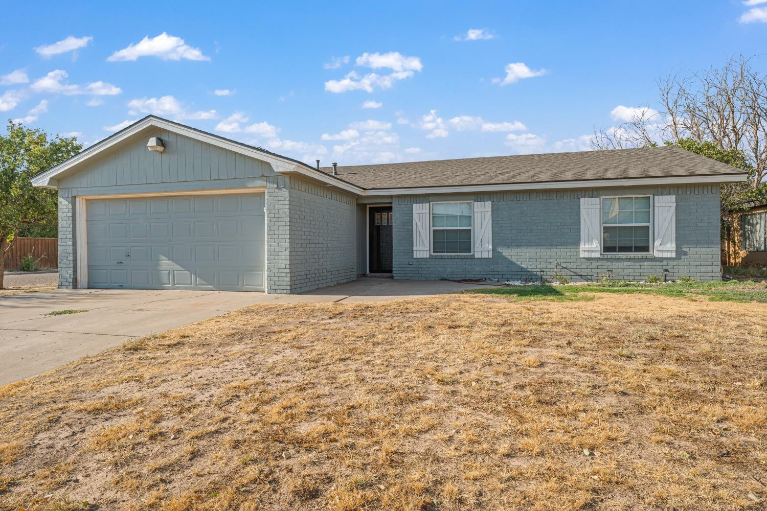 6154 38th Street Lubbock, TX 79407 - Photo 2 of 23 a house view with a outdoor space