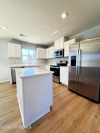 a view of a room with an empty space