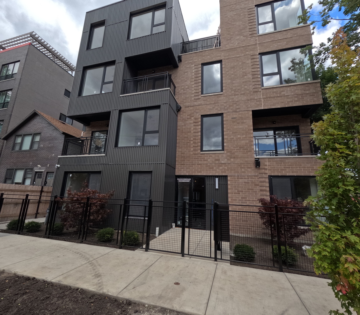 2100 West 18th Place, Unit 401 Chicago, IL 60608 - Photo 1 of 13 a view of multiple houses