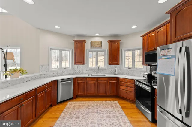 a bedroom with a bed and a table in it