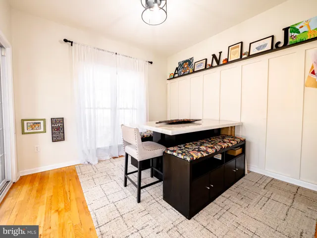 a bed room with a bed and a desk