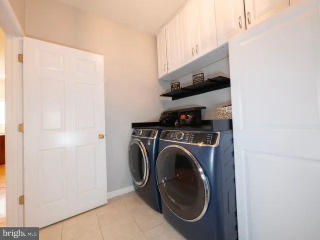 a bathroom with a sink toilet and mirror
