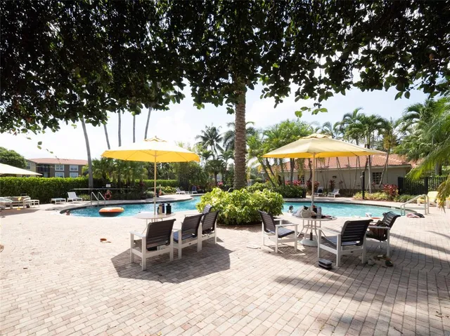 a view of a building with sitting area