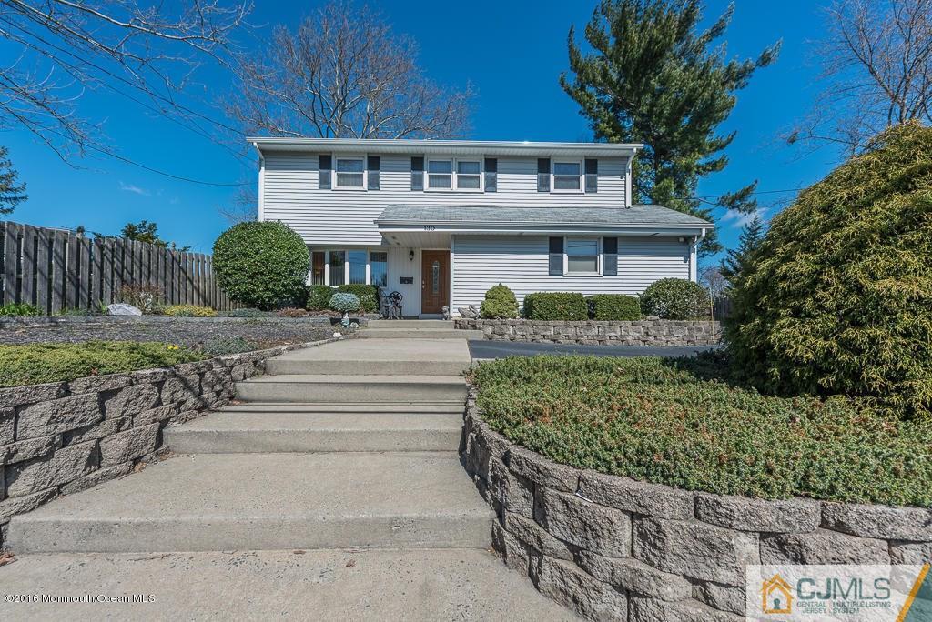130 Bethany Road Hazlet, NJ 07730 - Photo 1 of 24 a front view of a house with a garden