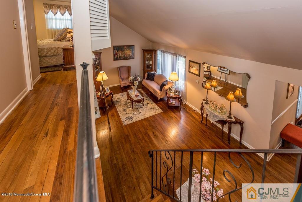 130 Bethany Road Hazlet, NJ 07730 - Photo 15 of 24 a view of a living room and dining room