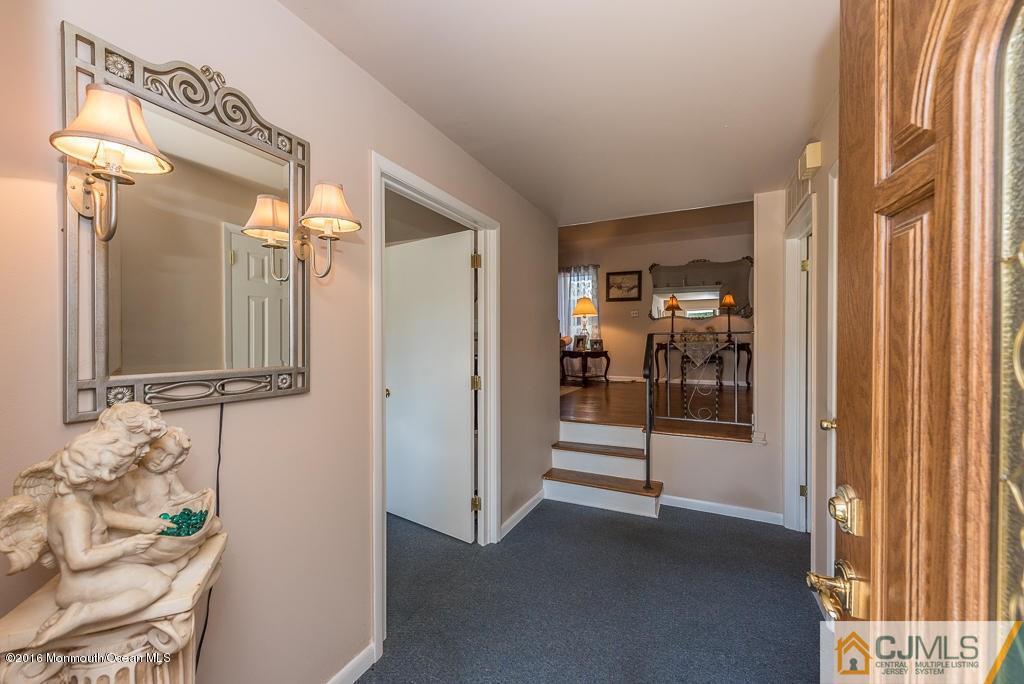 130 Bethany Road Hazlet, NJ 07730 - Photo 4 of 24 a view of a hallway with interior of the house