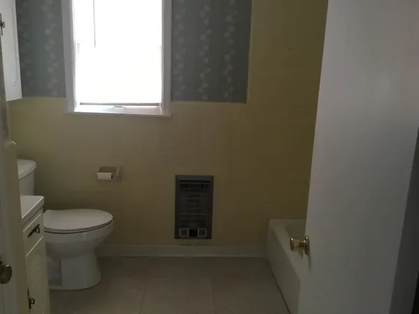 a bathroom with a toilet