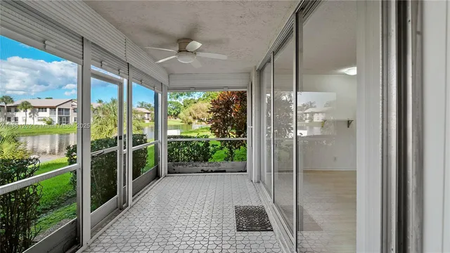 a view of a glass door and porch