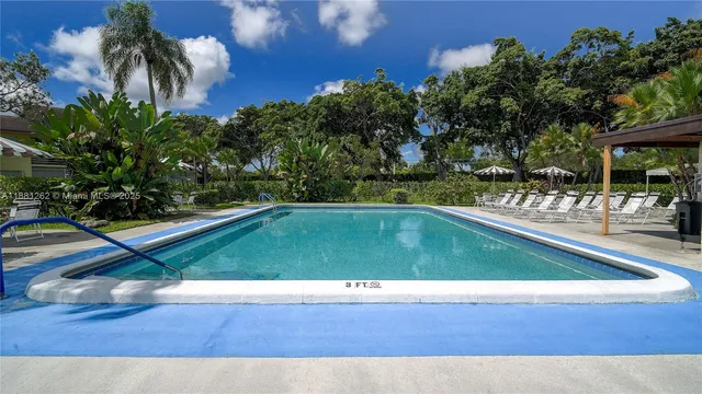 a view of outdoor space and swimming pool