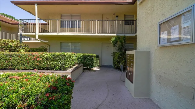a view of a pathway with a building in the background