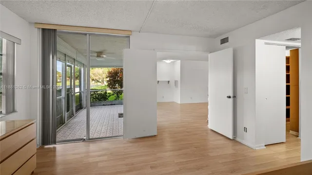 a view of entryway with wooden floor