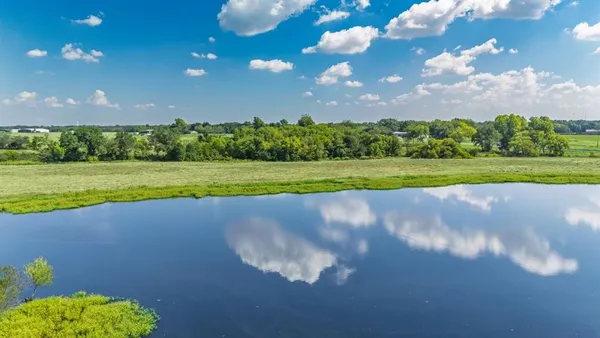 a view of a golf course with a yard