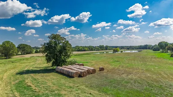 a view of a lake with a big yard