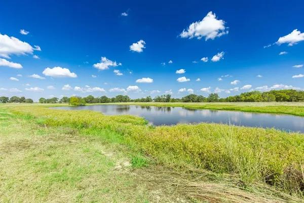 a view of a lake with outdoor space